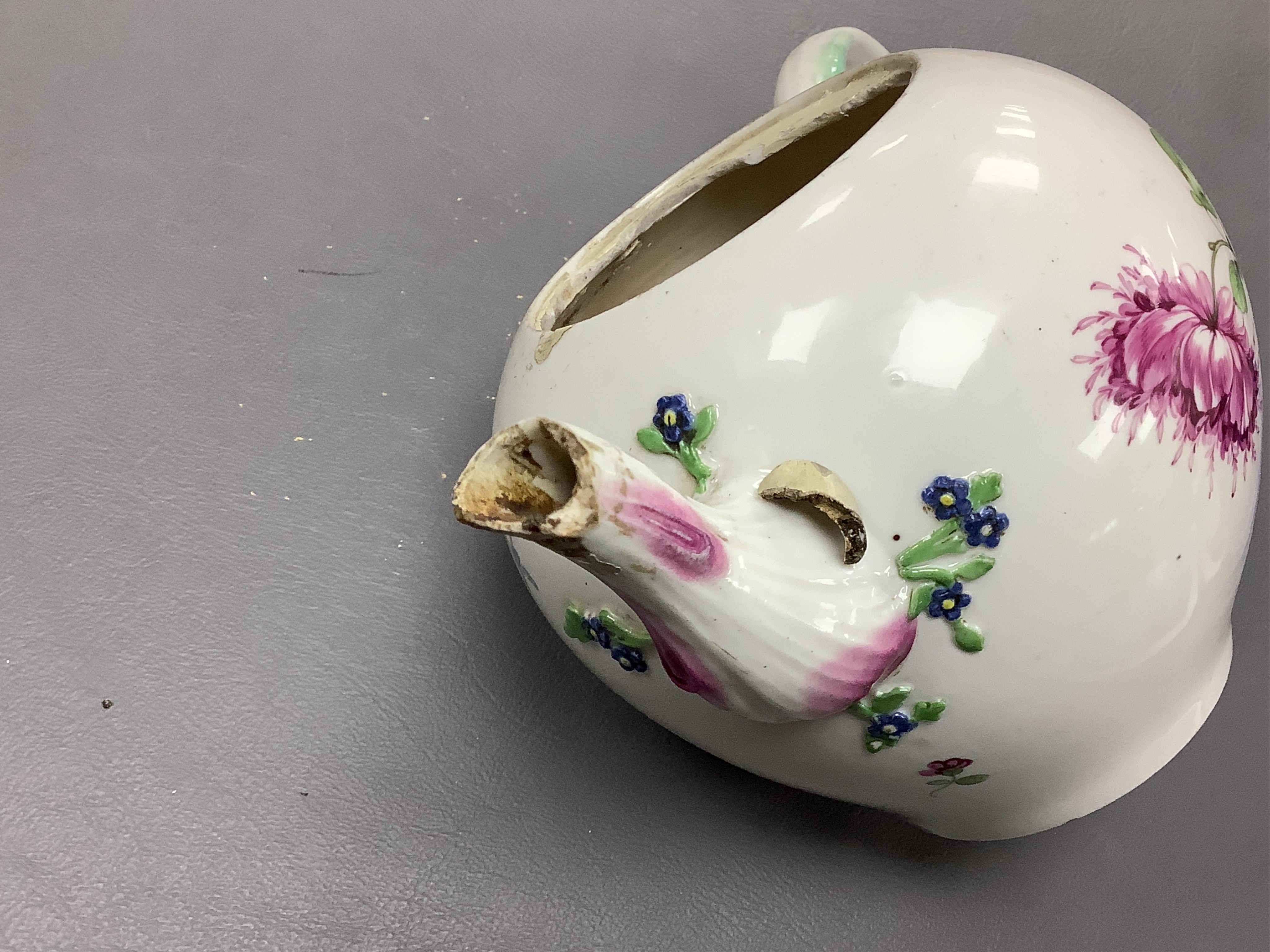 The Hague, a late 18th century soft paste porcelain teapot, painted with polychrome flowers, 12cm high